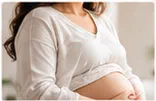 Pregnant woman receiving specialist care